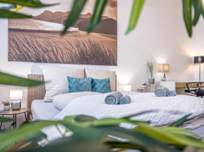 Gemütliche Ferienwohnung mit 2 Schlafzimmern, kostenfreiem Parkplatz, modernem Bad, Küche, Waschmaschine & Trockner